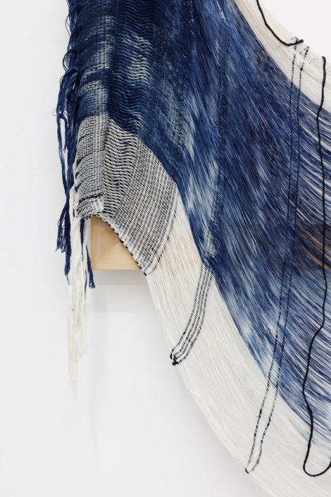 Weaving (release), 2024, Handwoven, indigo-dyed cotton, hand-dyed tensel, maple, 26 x 61 x 1.5 in