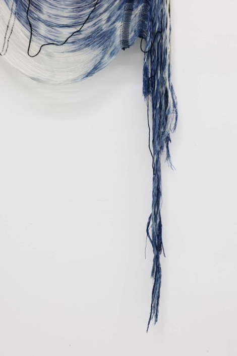 Weaving (release), 2024, Handwoven, indigo-dyed cotton, hand-dyed tensel, maple, 26 x 61 x 1.5 in
