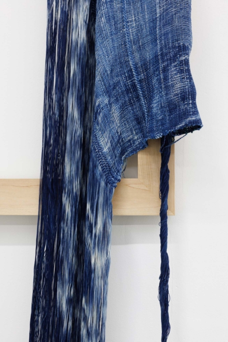 Weaving (long enough), 2024. Handwoven, indigo-dyed cotton, hand-dyed tensel, maple, 26 1/4 x 70 x 1.5 in