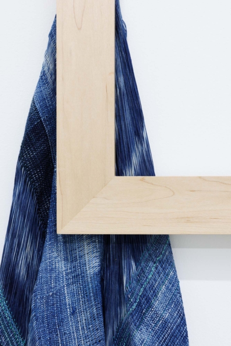 Weaving (long enough), 2024. Handwoven, indigo-dyed cotton, hand-dyed tensel, maple, 26 1/4 x 70 x 1.5 in